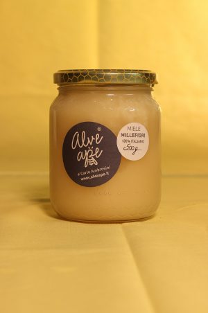 Confezione da 500 grammi del miele millefiori dell'azienda Alveape